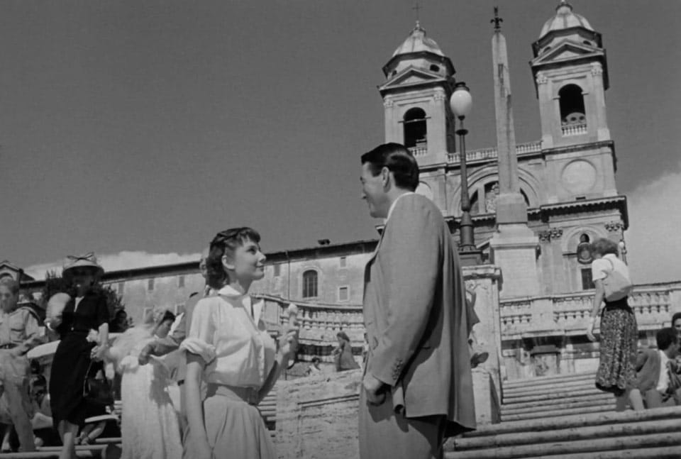 A scene from the movie Roman Holiday Audrey Hepburn and Gregory Pak on the Spanish-Steps