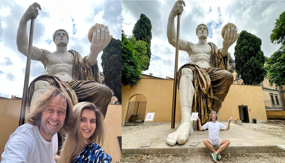 Artur Jakucewicz and Kate Zusmann next to the restored statue of Constantine the Great in Rome