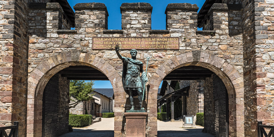 Statue of Antoninus Pius in front of the main gate of the Roman fort Saalburg near Frankfurt Germany