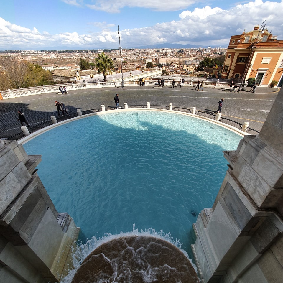 View of the Acqua Paola fountain's semicircular 1690 basin from inside the fountain's niche, Rome