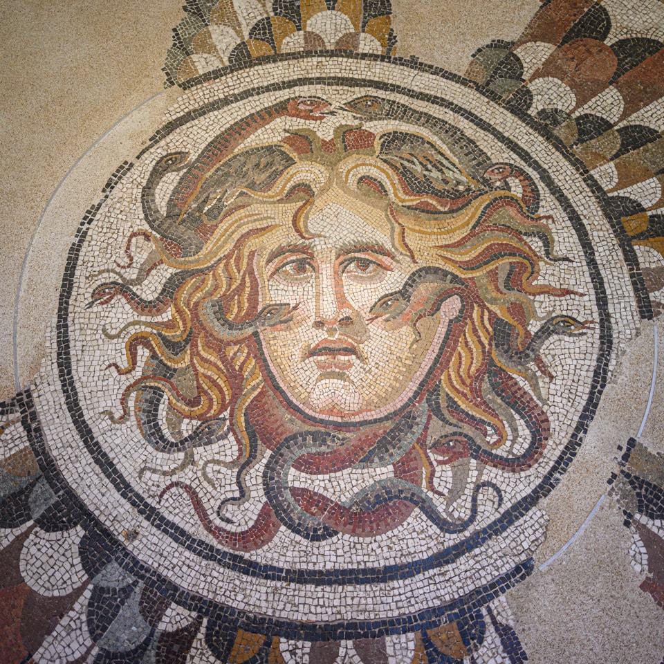 Ancient Roman floor mosaic with the head of Medusa (Gorgoneion) at the Baths of Diocletian museum, Rome