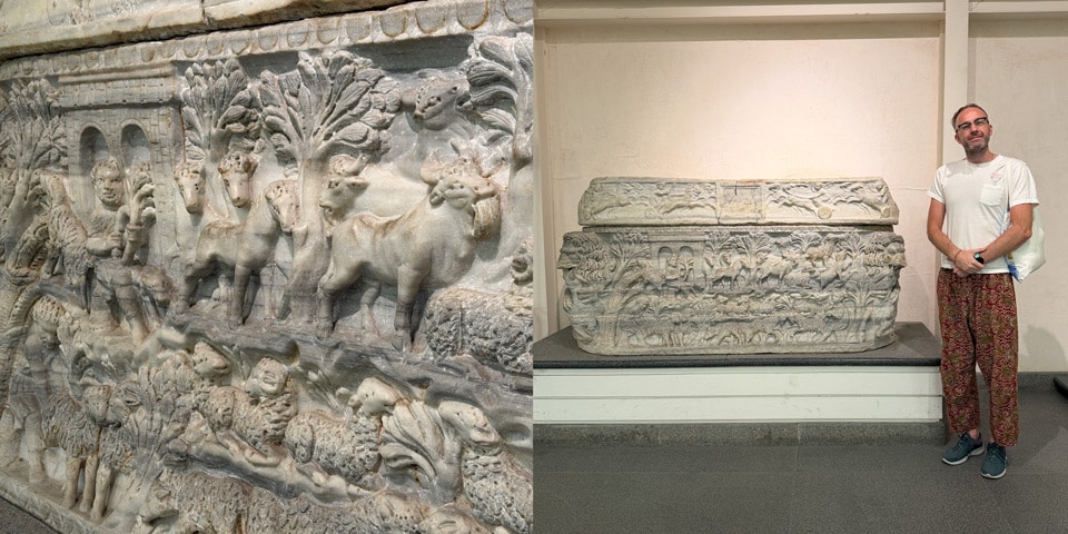 Artur Jakucewicz beside a Roman marble sarcophagus with pastoral scenes (circa 270 AD) at the Baths of Diocletian museum, Rome