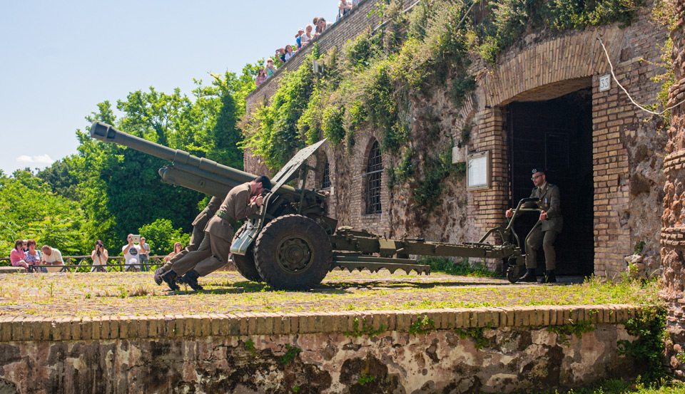 Italian Army soldiers rolling Il Cannone del Gianicolo back into its brick casemate after the daily noon firing, Janiculum, Rome