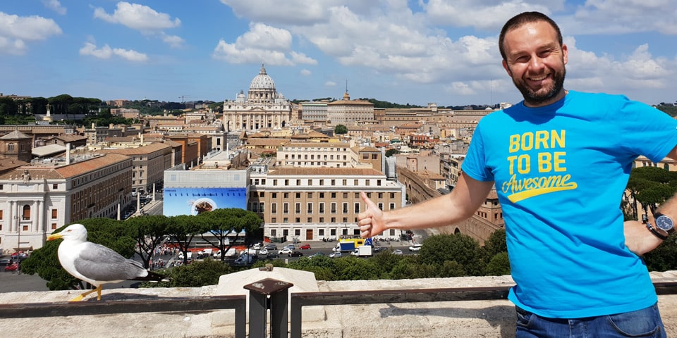 Artur Jakucewicz on the terrace of Castel Sant'Angelo with St. Peter's Basilica in the background, Rome