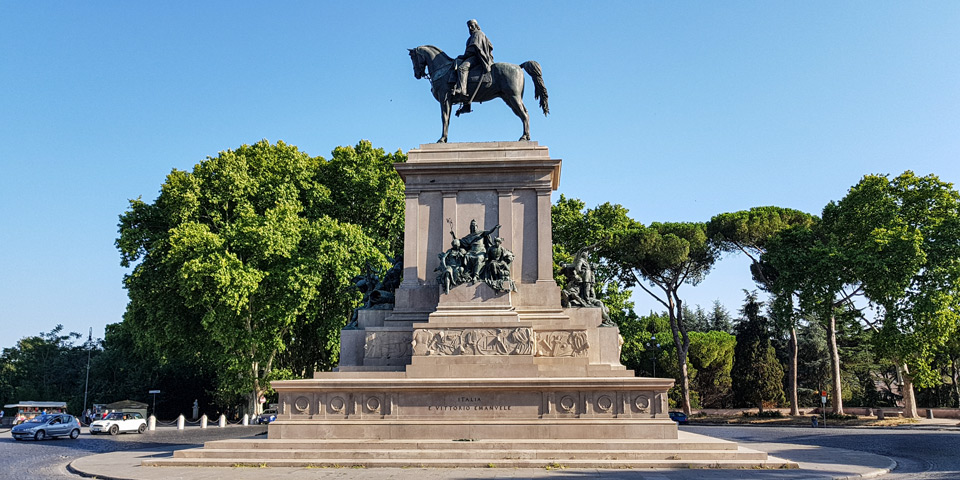 Full front view of the Giuseppe Garibaldi equestrian monument in Rome with the ITALIA E VITTORIO EMANUELE dedication inscription on the base