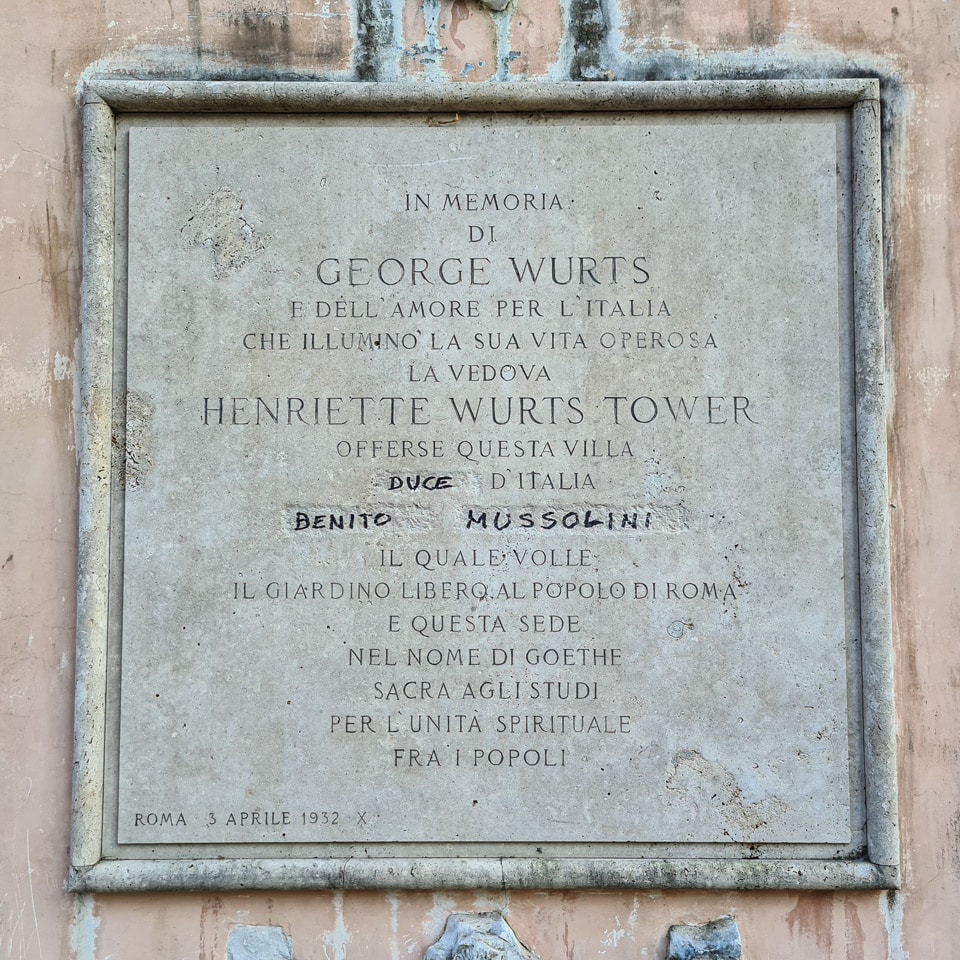 1932 George Wurts memorial plaque at Villa Sciarra with the erased and later rewritten name of Benito Mussolini