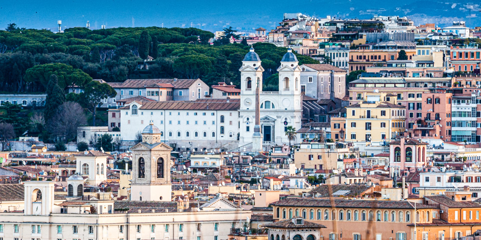 Twin bell towers of Trinità dei Monti above the Spanish Steps, seen with a telephoto lens from Piazzale Garibaldi, Rome