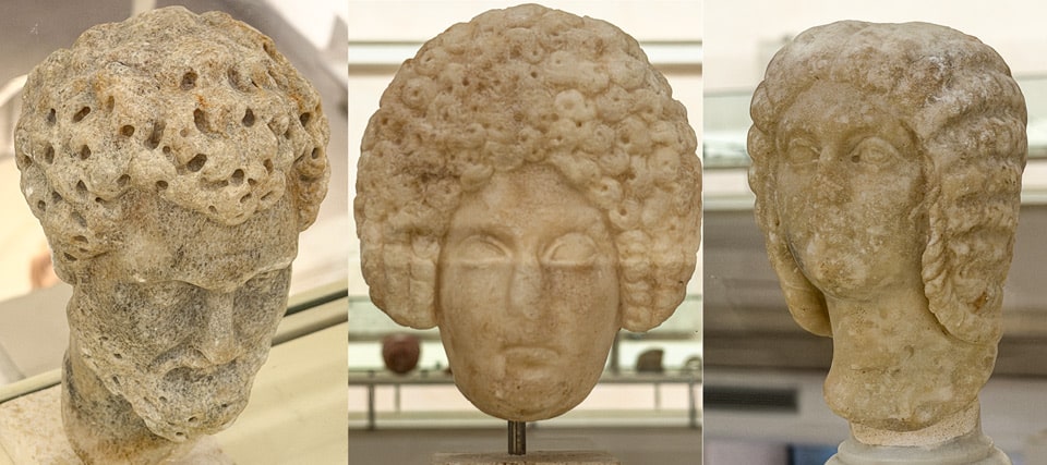 Ancient Roman marble portrait heads showing male and female imperial hairstyles, National Roman Museum, Baths of Diocletian, Rome