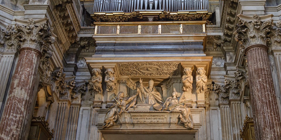 the tomb of Pope Innocent X crafted by the sculptor Giovanni Battista Maini in church Sant'Agnese in Agone Rome